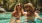 a man and woman in a pool